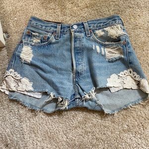 Reformation vintage Levi’s 501 cutoffs with lace embellishments - XS